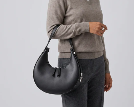 Shoulder bag—PU leather, with adjustable shoulder strap.