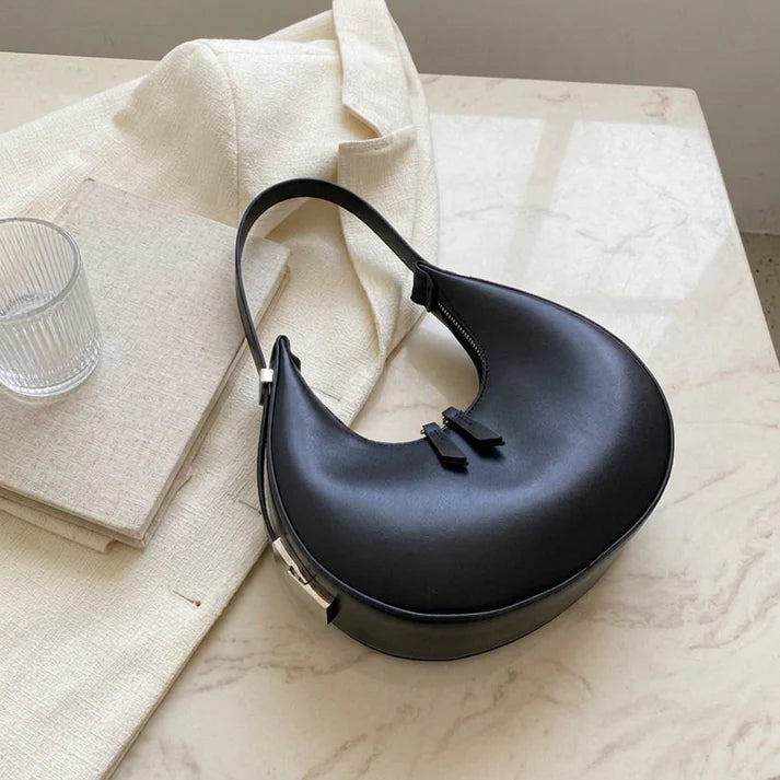 Shoulder bag—PU leather, with adjustable shoulder strap.